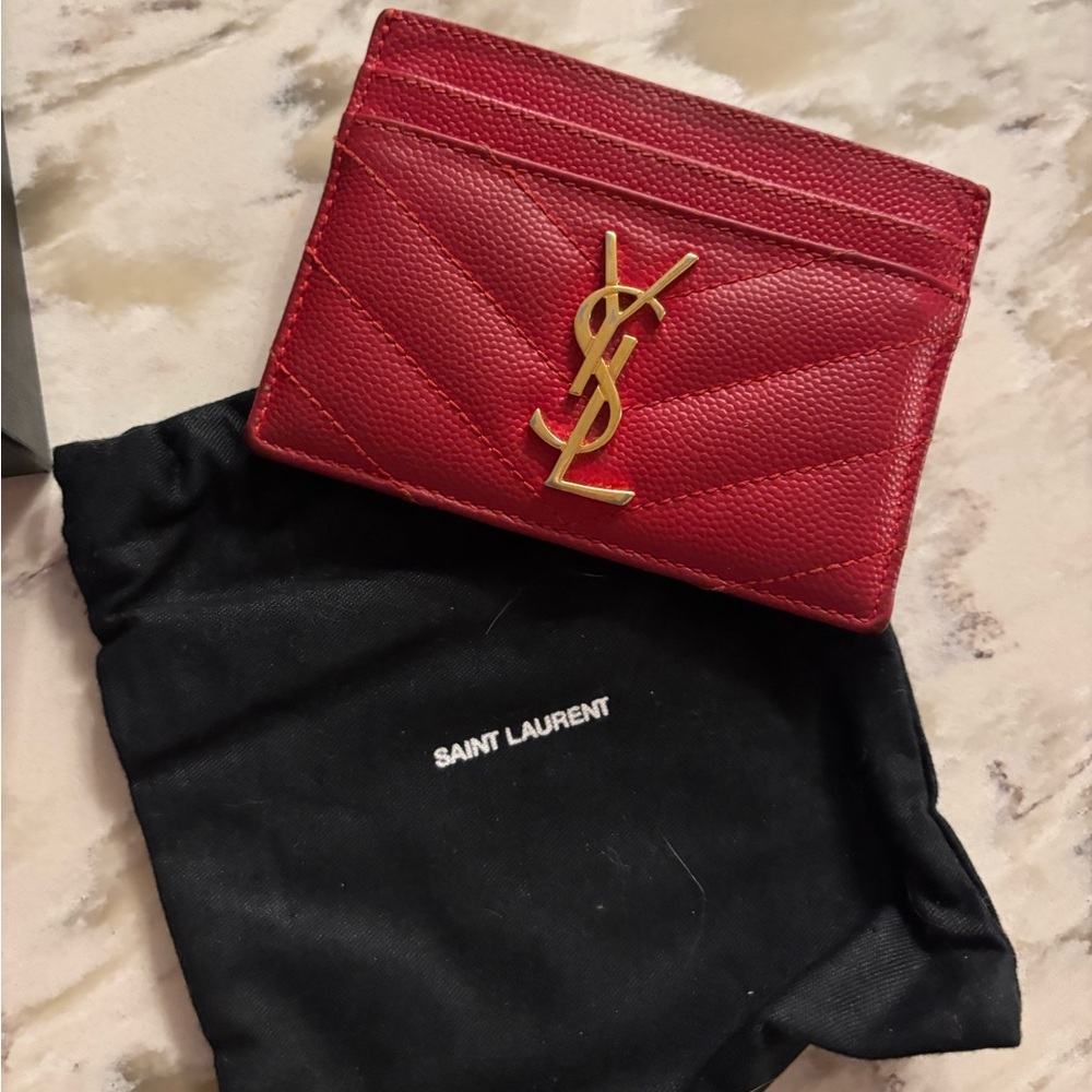 Red YSL card holder.